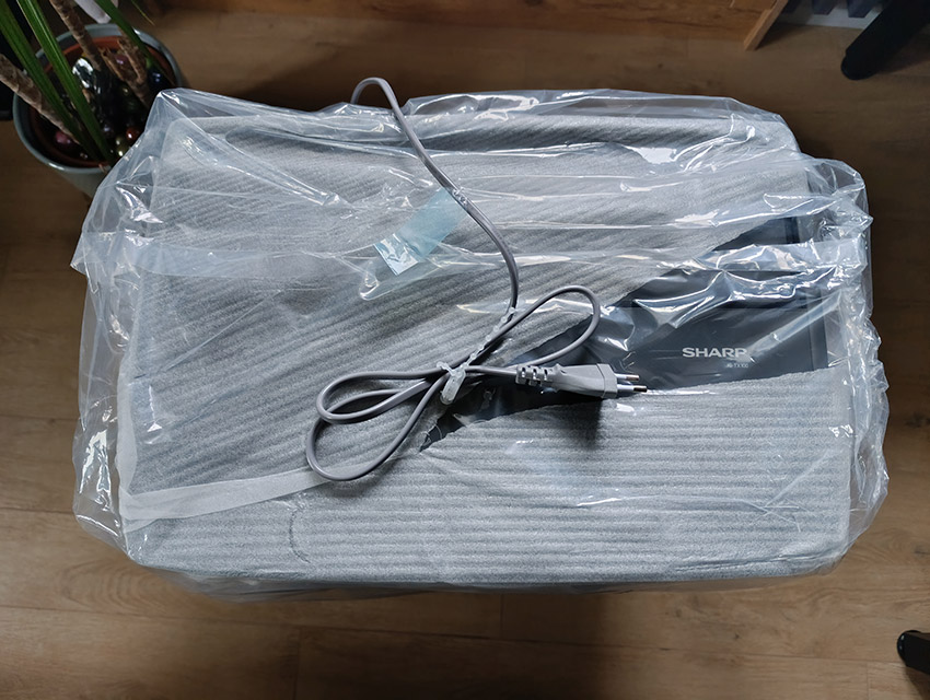 Sharp KI-TX100EU-H – in Schutzfolie